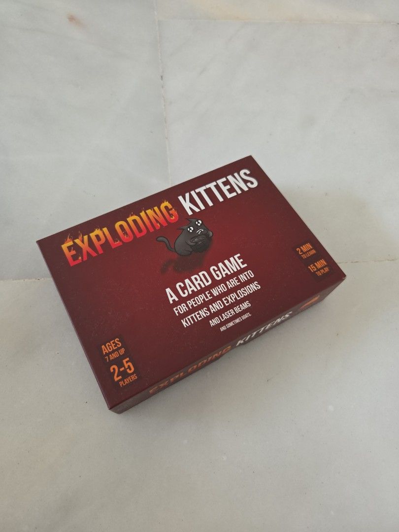 Exploding Kittens Card Game (Category: Board Games & Puzzles) located in Singapore. Submitted by teckitoo (Listing ID 1434408347, Image 1). Description: - Exploding Kittens card game - self pick up - used but not abused.