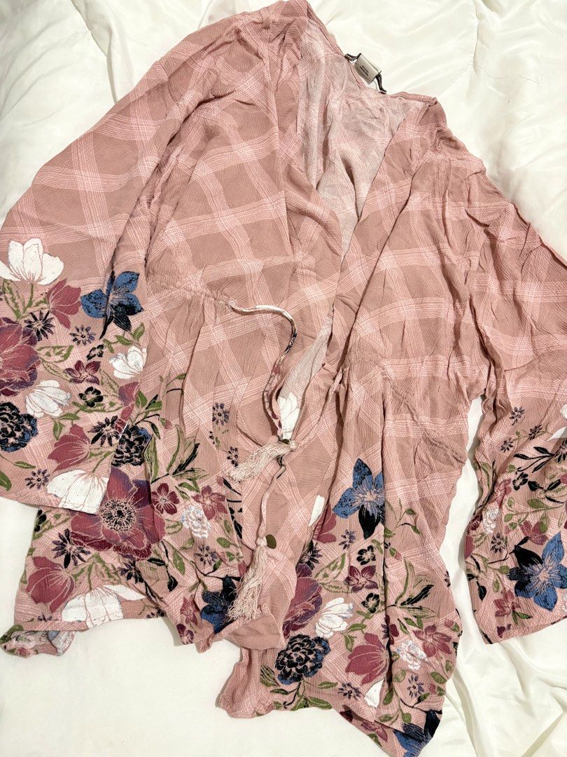 Floral Print Kimono (Category: Coats, Jackets and Outerwear) located in Manila. Submitted by sbm07 (Listing ID 1434475556, Image 1). Description: - Floral print kimono - Pink plaid background - Long, wide sleeves - Tie closure - Lightweight and soft fabric - Great for layering.