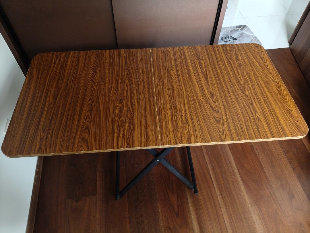 foldable table (Category: Tables & Sets) located in Singapore. Submitted by kengchong (Listing ID 1434405379, Image 2). Description: foldtable table, 1.2m when opened. height - 0.74m, width 0.6m compact, easy to setup and store. good for outdoor or when need an extra table.