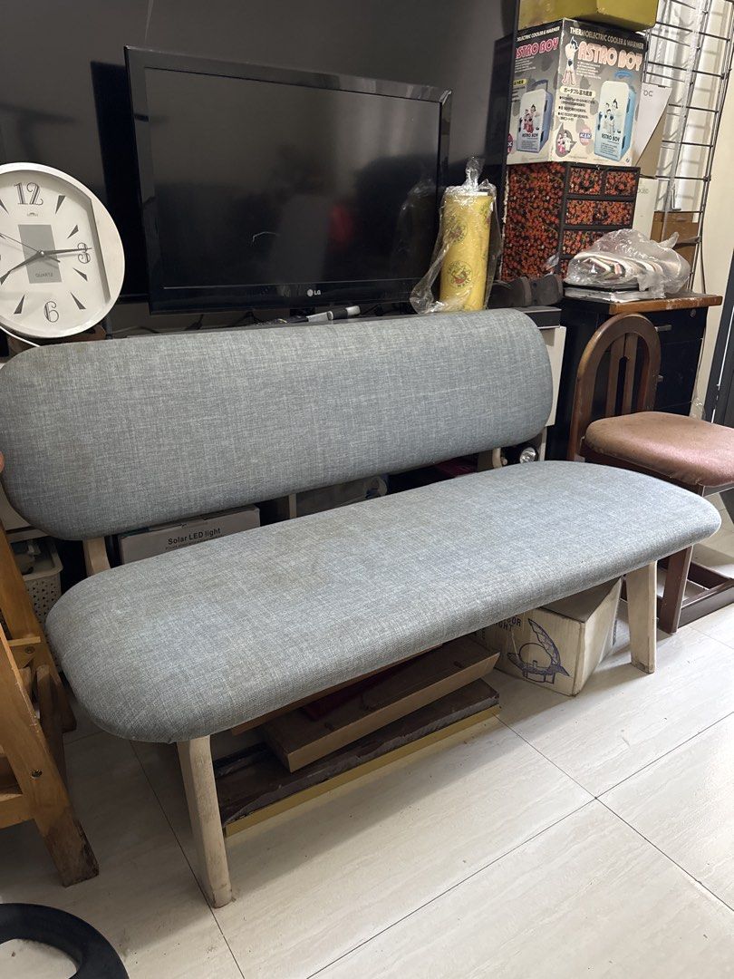 Nitori Grey Fabric 2.5 seater Sofa (Category: Chairs) located in Quezon City. Submitted by elektra0111 (Listing ID 1434389431, Image 2). Description: - Modern bench design - Features a grey fabric seat and backrest - Supported by a light-colored wooden frame - Sturdy and comfortable seating - Ideal for entryways, living rooms, and bedrooms - L 120cm W 60cm HSP 38cm.
