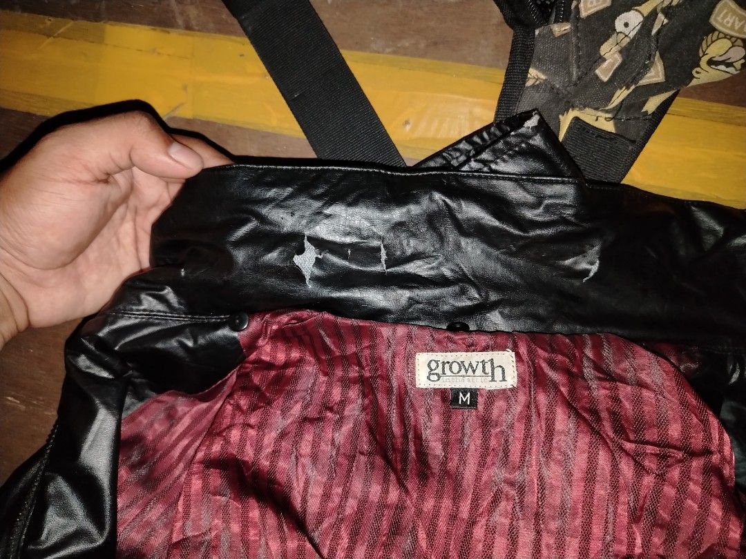 Growth Black Jacket (Category: Coats, Jackets and Outerwear) located in Manila. Submitted by stepsole (Listing ID 1432686625, Image 2). Description: - Black Growth jacket - Full zip closure - Stand-up collar - Quilted design on shoulders and sleeves - Two chest pockets - Two side pockets - Burgundy interior lining -minor flaws.
