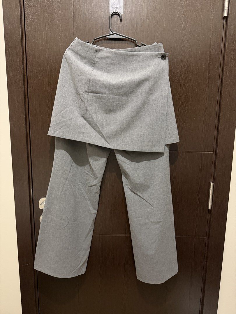 GU 2-in-1 Gray Skirt & Pants Set (Category: Other Bottoms) located in Taguig. Submitted by 77dbae (Listing ID 1434545499, Image 1). Description: GU 2-in-1 Grey Skirt & Pants Set - Size L - from Japan - pants used once (length: 40in) - pants/skirt can be used alone rfs: decluttering.