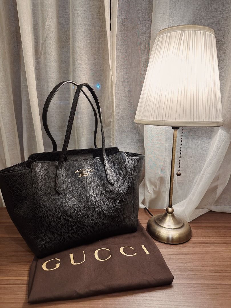 GUCCI SWING LEATHER TOTE (Category: Luxury Bags & Wallets) located in Muntinlupa City. Submitted by smh000 (Listing ID 1434471420, Image 1). Description: AUTHENTIC NO SMELL, NICE STRUCTURE, LIGHTWEIGHT INCLUSION: Dust Bag, Cards SOURCE: JAPAN SECONDHAND STORE.