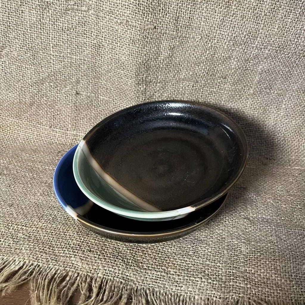 Handmade Ceramic Snack Plates - Set of 2 (Category: Dinnerware & Cutlery) located in Bulacan. Submitted by ceramicscubby (Listing ID 1434505509, Image 1). Description: • Size: 6.25 D x 1.25 H in. ❗️CLOSING DOWN SALE, ALL PRICES ARE MARKED DOWN. WE WILL NOT BE ACCEPTING OFFERS LOWER THAN OUR ASKING PRICE. ❗️ - Set of two handmade ceramic plates - Unique designs on each plate - Colors: Blue, green, black, and white - Round shape with slightly raise