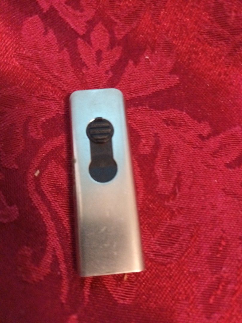 HP USB 3.1 Flash Drive (Category: Hard Disks & Thumbdrives) located in Makati City. Submitted by epic_prelovedmakati (Listing ID 1434476006, Image 1). Description: - Original HP USB 3.1 Flash Drive - 16 GB - Silver casing with HP logo - Compact and portable design - Features a black button - Includes a hole for attaching to keychains or lanyards.