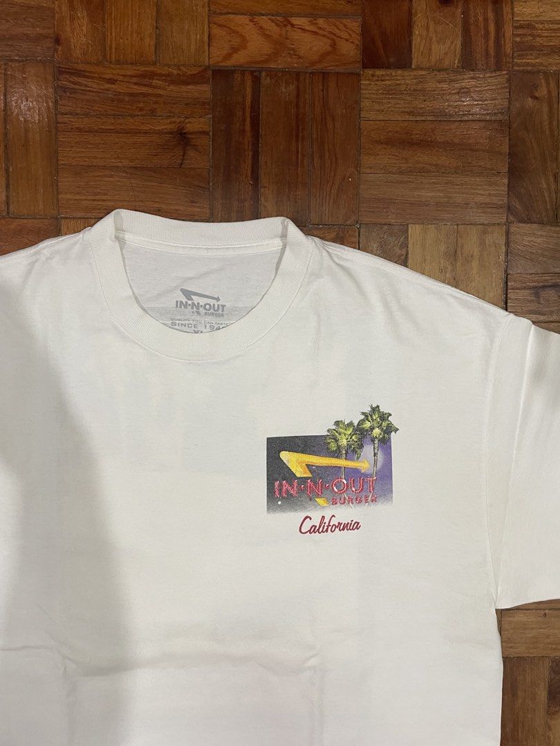 In N Out Shirt (Category: Tshirts & Polo Shirts ) located in Quezon City. Submitted by declutter.studios (Listing ID 1434419137, Image 3). Description: WIDTH (PIT TO PIT): 22.5 LENGTH: 30 MINE - ₱[PRICE] ✨ NOTES: FRONT STAIN, GOOD CONDITION ⚠️ FLAWS: STAIN ON FRONT 🚛 ADDITIONAL SHIPPING FEE 📩 MESSAGE ME FOR MORE DETAILS OR INQUIRIES!.