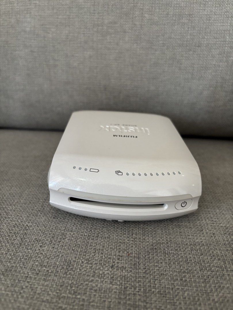 Instax Share Printer (SP-1) (Category: Other Photography Accessories) located in San Fernando. Submitted by yunie_corn (Listing ID 1434410432, Image 2). Description: ✅ Print photos from your smartphone using the Instax Share App ✅ Includes a power supply as an alternative for batteries (must be plugged in to use it) ✅ Battery and films not included ✅ Still works 100% ✅ The prints turn out blue instead of the usual colors (looks more vintage) ✅ No
