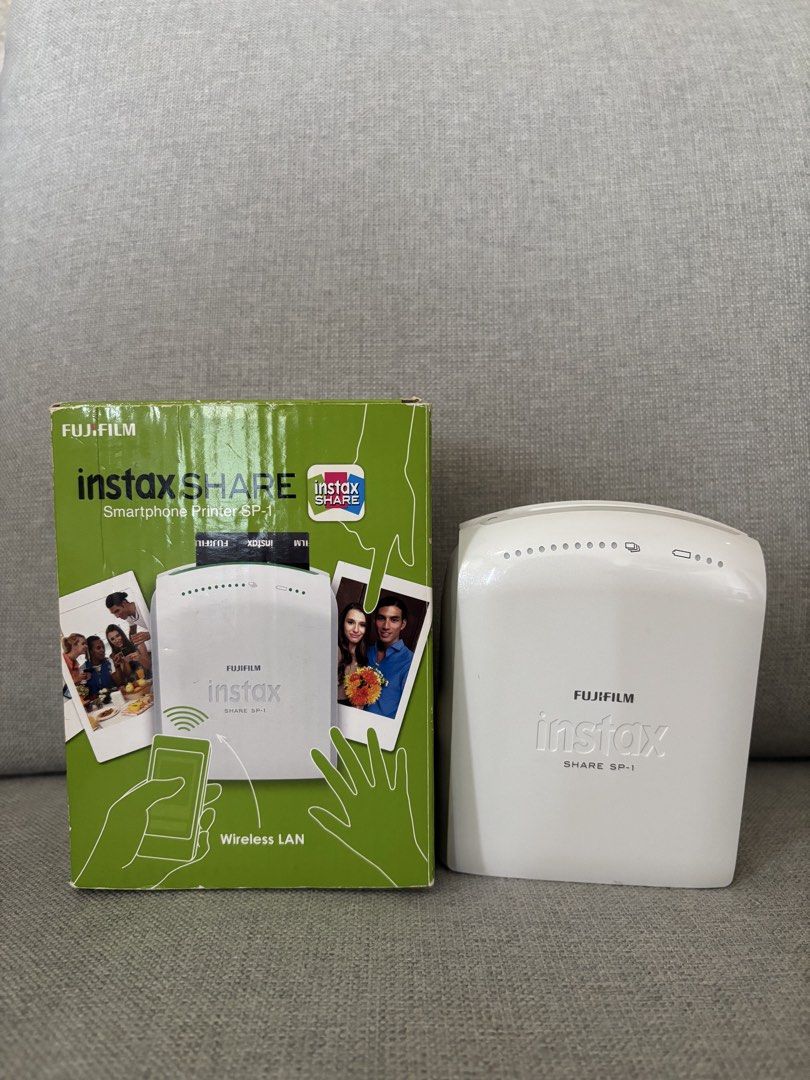 Instax Share Printer (SP-1) (Category: Other Photography Accessories) located in San Fernando. Submitted by yunie_corn (Listing ID 1434410432, Image 1). Description: ✅ Print photos from your smartphone using the Instax Share App ✅ Includes a power supply as an alternative for batteries (must be plugged in to use it) ✅ Battery and films not included ✅ Still works 100% ✅ The prints turn out blue instead of the usual colors (looks more vintage) ✅ No