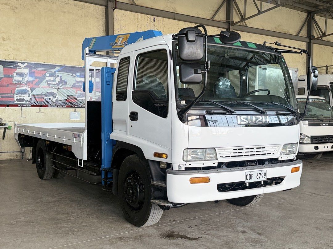 Isuzu Forward Self loader with Boom LongJack 6HE1 inline (Category: Heavy Vehicles) located in Bulacan. Submitted by arvin_custodio (Listing ID 1434442267, Image 3). Description: Selfloader with boom 3T Longjack 6HE1 inline 10R tire size 8stud Complete papers Ready to pullout Call: 09190969833.