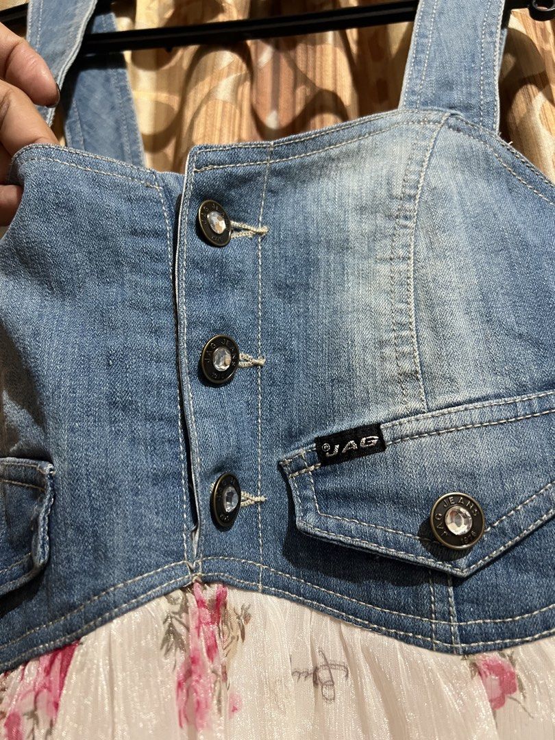 Jag Jeans Denim Dress (Category: Dresses) located in Cabanatuan. Submitted by imported2023 (Listing ID 1434537961, Image 2). Description: - Brand: Jag Jeans - Size: M - Style: Casual dress - Features: Denim top with button details, floral print skirt, tiered skirt design.