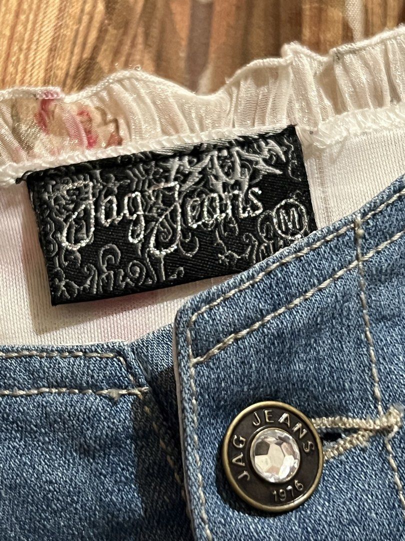 Jag Jeans Denim Dress (Category: Dresses) located in Cabanatuan. Submitted by imported2023 (Listing ID 1434537961, Image 3). Description: - Brand: Jag Jeans - Size: M - Style: Casual dress - Features: Denim top with button details, floral print skirt, tiered skirt design.