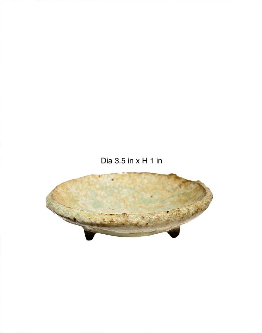 Japanese Clay Footed Bowl (Small, 2pcs) (Category: Other Kitchenware & Tableware) located in Tacloban City. Submitted by ana.kiwi (Listing ID 1434446937, Image 1). Description: - 2 pcs small textured ceramic bowls wabi sabi style - Diameter: 3.5 inches - Height: 1 inch - Features three small feet - Color: Light, earthy tone - Ideal for serving small portions, jewelry tray, or as a decorative item.