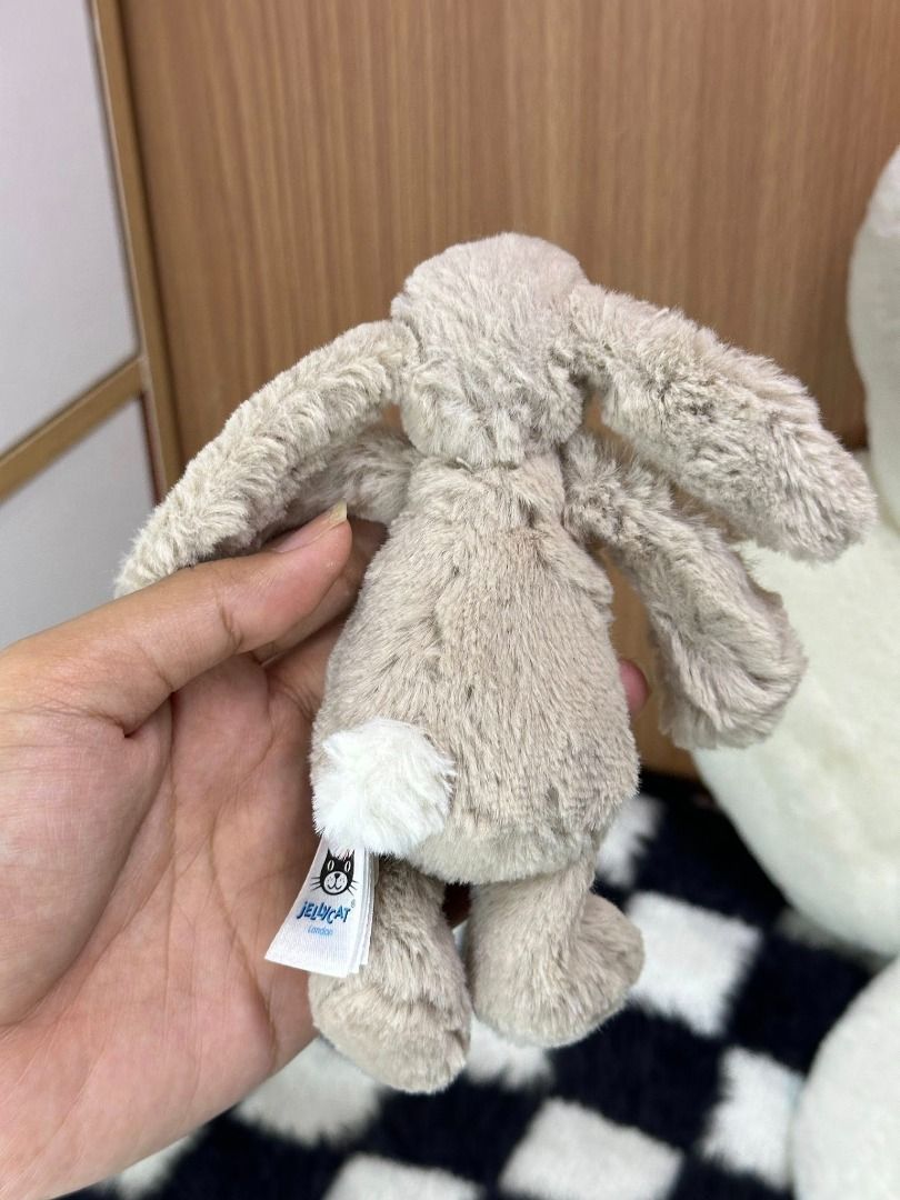 Jelly Cat Amuseables : Bashful Beige/ Gray /Silver Baby Bunny Tiny (Category: Designer & Blind Box Toys) located in Quezon City. Submitted by genie.fluff (Listing ID 1434594424, Image 2). Description: TINY SIZED: 5-7IN With tags and Serial CODE : JELLY8497 ✬✬CERTIFIED GENUINE AND AUTHENTIC BY JELLYCAT COLLECTORS✬✬ I can't determine which color scheme it is XD .