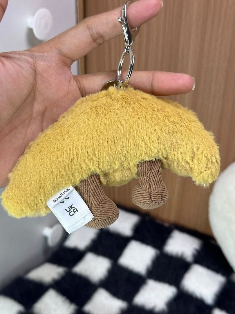 Jellycat Amuseables : Croissant Bag Charm Strap Keychain (Category: Charms) located in Quezon City. Submitted by genie.fluff (Listing ID 1434593259, Image 3). Description: ⚠️ ⚠️ Authenticity not guaranteed please scan all photos for more info JELLYCAT SERIAL: SHANG1464IL.