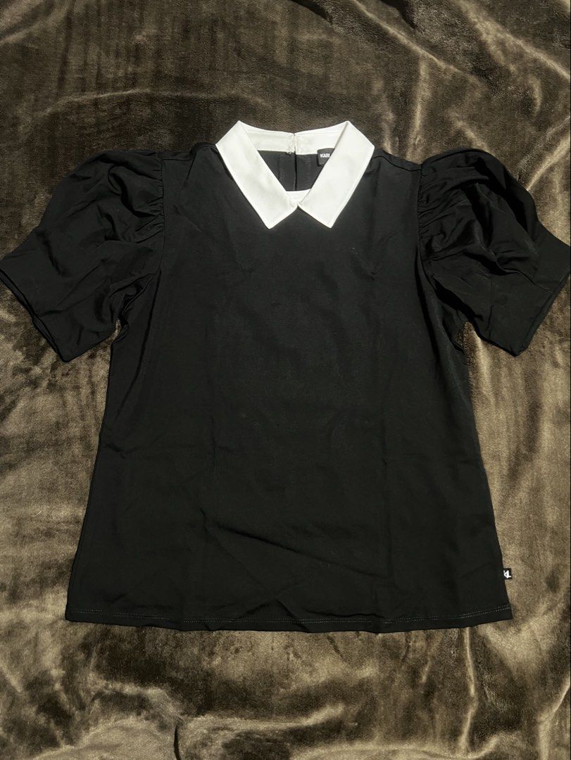 Karl Lagerfeld Shirt (Category: Shirts) located in Manila. Submitted by skiesdeclutter (Listing ID 1396119553, Image 2). Description: - Karl Lagerfeld Paris top - Size: S - Color: Black with white collar - Design: Collared with puff sleeves - Closure: Back button - Includes: Extra button - Fabric composition visible on tag.