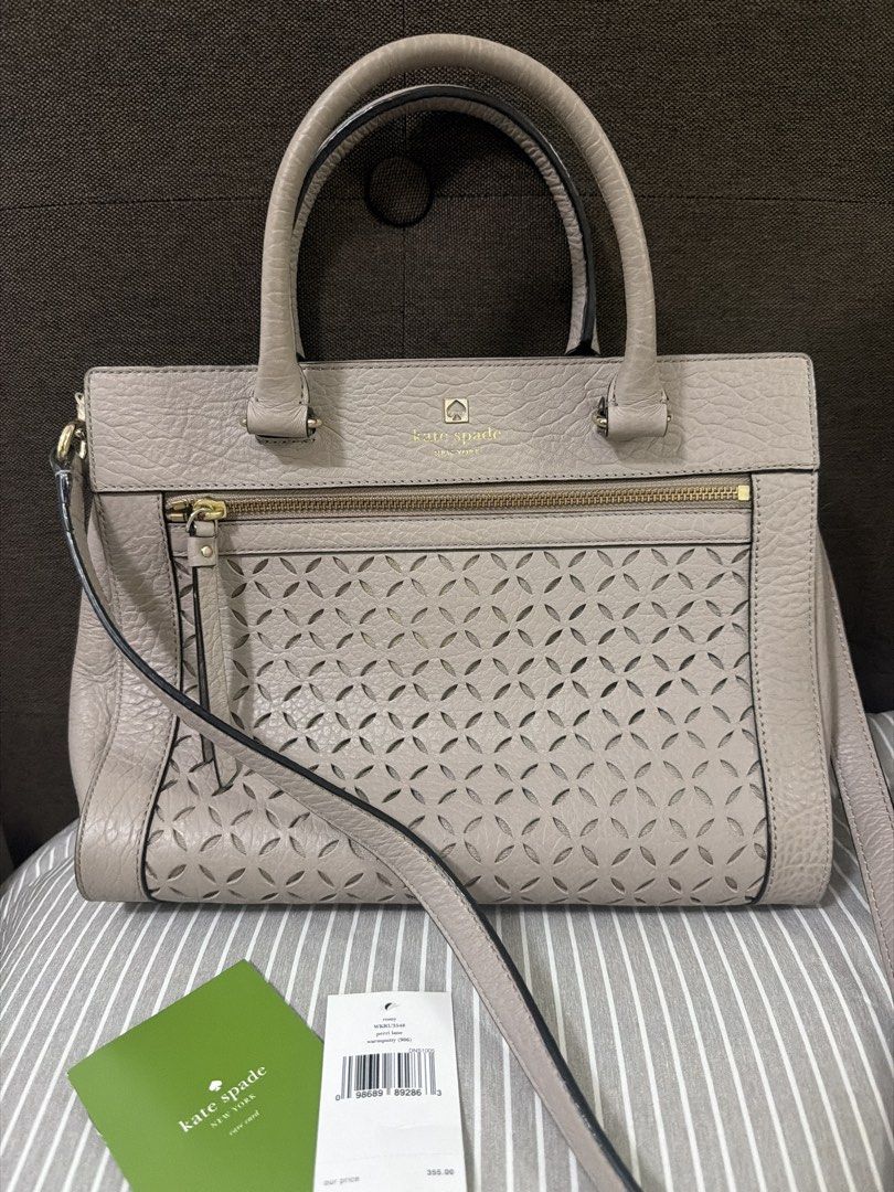 Kate Spade bag (Category: Luxury Bags & Wallets) located in Pateros City. Submitted by nightingayle29 (Listing ID 1434453037, Image 1). Description: - Kate Spade satchel - Perforated design - Top handle - Detachable shoulder strap - Zip closure - Interior pocket - Gold-toned hardware - used twice with tags - Kate Spade logo lining.