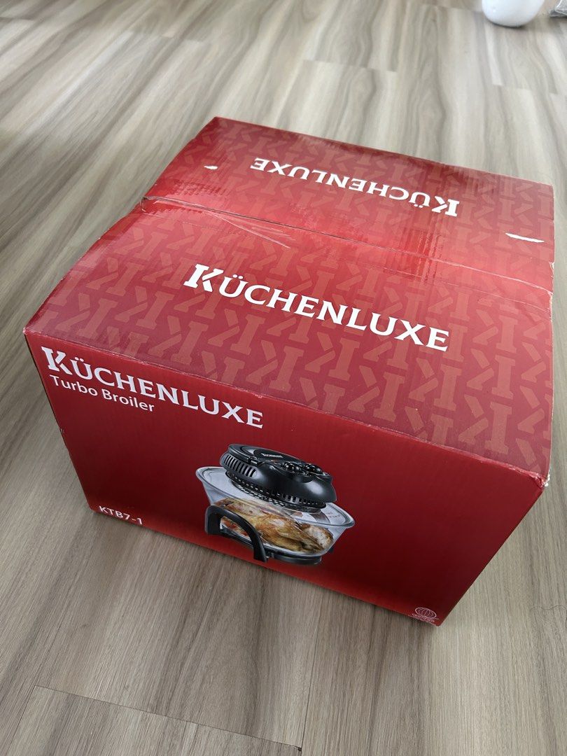 Küchenluxe Turbo Broiler KTB7-1 (Category: Cookware & Accessories) located in Taguig. Submitted by prelovedcloset2 (Listing ID 1434485764, Image 2). Description: - Küchenluxe Turbo Broiler KTB7-1 - 7.0L glass bowl - 60-minute timer - Temperature control up to 250 degrees - Includes low rack and tongs - Ideal for cooking various dishes - Functions: Roasting, baking, and grilling. - Never opened, never used - Retails for 5,700 Helping tags: Imarfle
