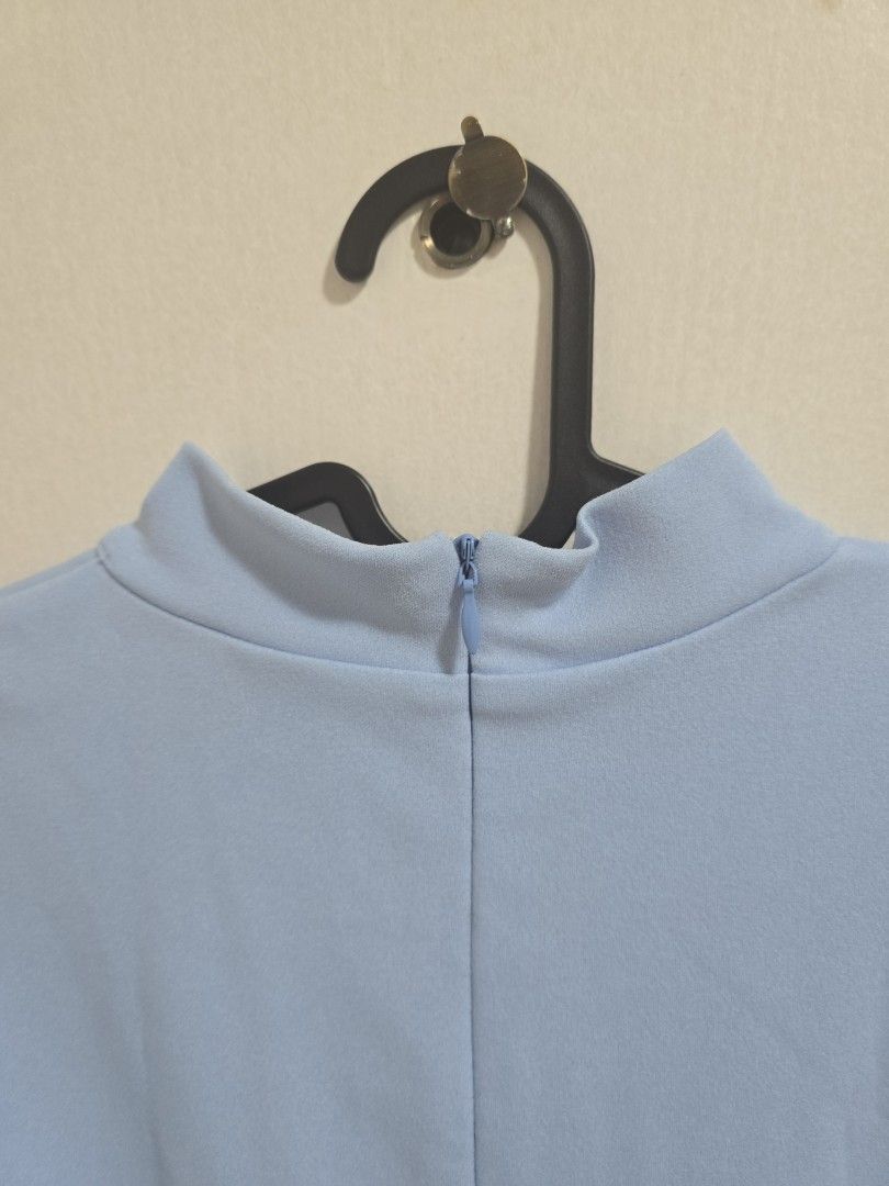 Light Blue Sleeveless Dress (Category: Dresses) located in Pasig City. Submitted by callmemaf (Listing ID 1434390815, Image 3). Description: - Light blue sleeveless dress - Fitted silhouette - Subtle waist seam detail - Side zipper closure - Made of smooth, possibly stretchy fabric - Suitable for various occasions - pwedeng hindi na plantsahin - no pockets - below the knee for 5'3" - fits up to bust 36, waist 29, hips 36 - cotton blend.