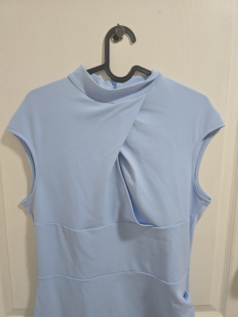 Light Blue Sleeveless Dress (Category: Dresses) located in Pasig City. Submitted by callmemaf (Listing ID 1434390815, Image 2). Description: - Light blue sleeveless dress - Fitted silhouette - Subtle waist seam detail - Side zipper closure - Made of smooth, possibly stretchy fabric - Suitable for various occasions - pwedeng hindi na plantsahin - no pockets - below the knee for 5'3" - fits up to bust 36, waist 29, hips 36 - cotton blend.