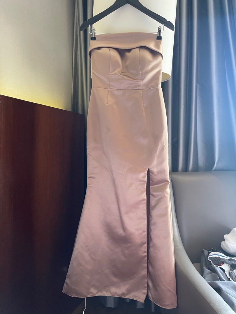 Long gown light brown (Category: Evening dresses & gowns) located in Quezon City. Submitted by booktt (Listing ID 1434405938, Image 2). Description: strapless gown featuring a fold-over band and a sultry skirt slit small to medium. for reference, can fit well for 5'2 bust 34 underbust 31 upperbust 33.5 figure 15.5 length 39.5 slit 15 hip 34 waist 28.5.