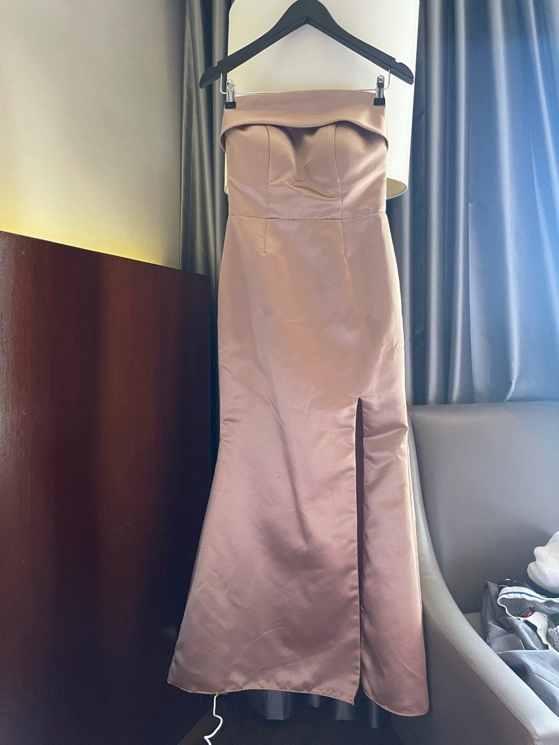 Long gown light brown (Category: Evening dresses & gowns) located in Quezon City. Submitted by booktt (Listing ID 1434405938, Image 1). Description: strapless gown featuring a fold-over band and a sultry skirt slit small to medium. for reference, can fit well for 5'2 bust 34 underbust 31 upperbust 33.5 figure 15.5 length 39.5 slit 15 hip 34 waist 28.5.