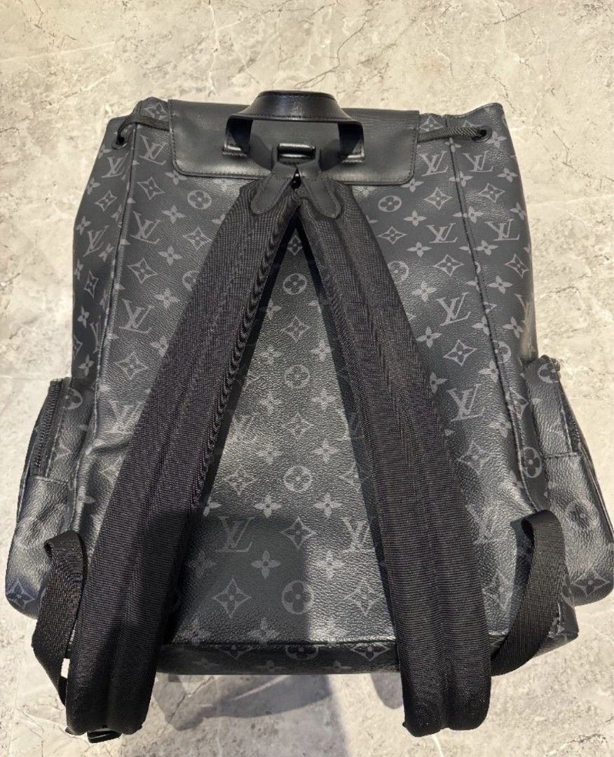 Louis Vuitton Monogram Eclipse Backpack (Category: Bags & Wallets) located in Singapore. Submitted by jpcy909 (Listing ID 1434442246, Image 2). Description: - Authentic Louis Vuitton Monogram Eclipse backpack. - Secure flap closure with buckle and drawstring. - Multiple pockets for organization. - Adjustable shoulder straps for a comfortable fit. - Ideal for everyday use and travel..