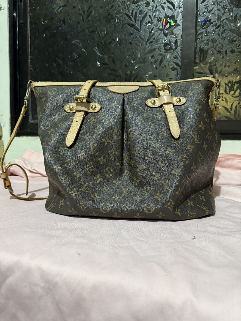 Louis Vuitton Palermo GM Monogram Canvas Bag (Category: Luxury Bags & Wallets) located in Pasig City. Submitted by help.a.hoarder.out (Listing ID 1434566920, Image 1). Description: - Louis Vuitton handbag - Monogram Canvas - Spacious interior with multiple compartments - Detachable shoulder strap - Zipper closure - Gold-tone hardware - Classic LV monogram pattern - Light-colored leather trim and straps - Authenticity not guranteed. Recieved as gi