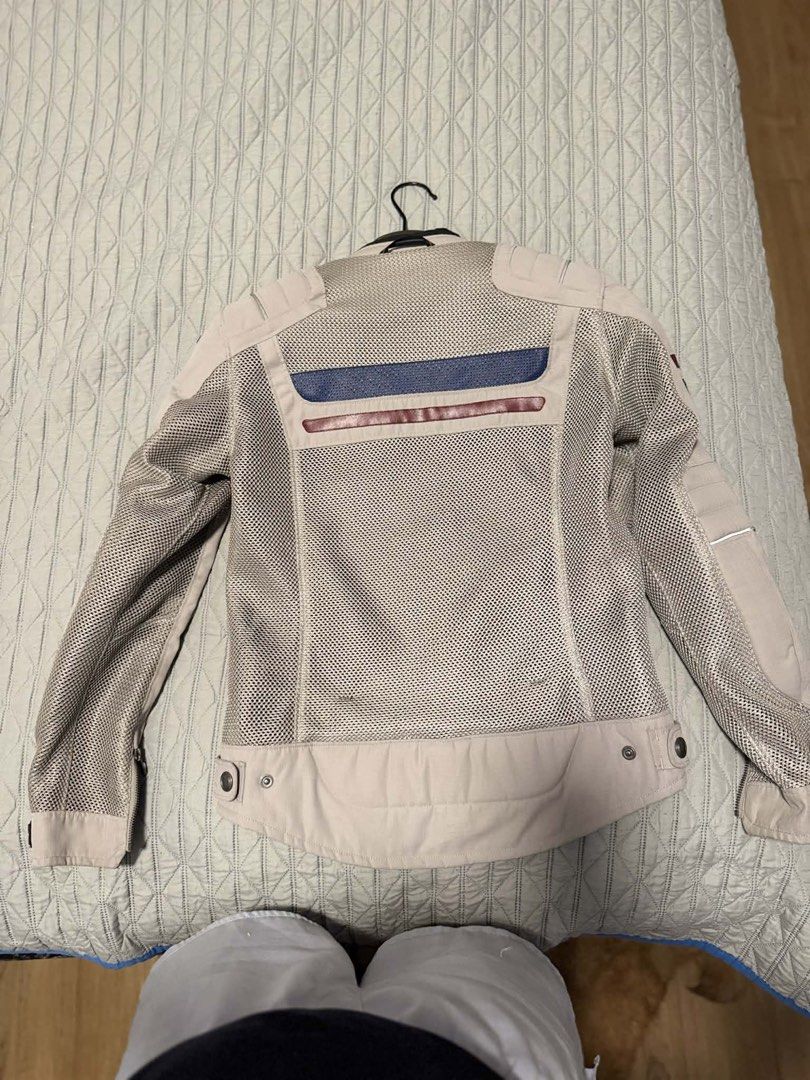 Macna Motorcycle Jacket - Women's Size S (Category: Coats, Jackets and Outerwear) located in Makati City. Submitted by phyles20 (Listing ID 1434537152, Image 1). Description: - Macna motorcycle jacket for women - Size: S - Design: Mesh with beige and blue accents - Features: Two front pockets, zipper closure - Inner lining: Black - Includes hanger.
