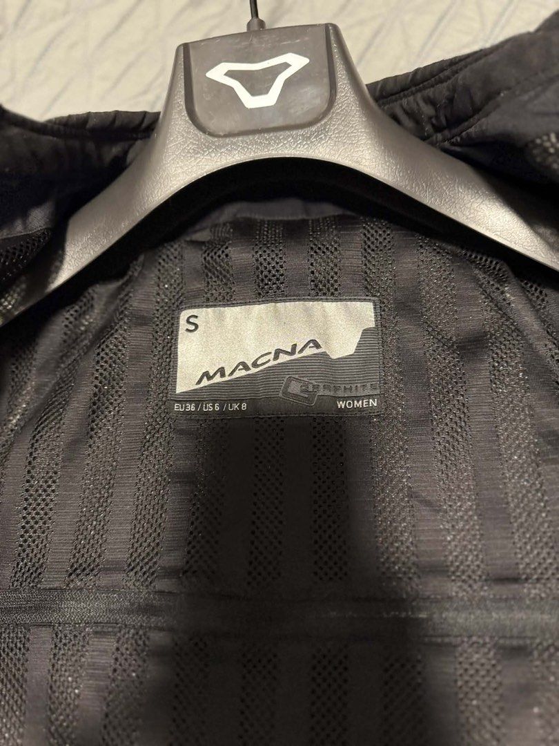 Macna Motorcycle Jacket - Women's Size S (Category: Coats, Jackets and Outerwear) located in Makati City. Submitted by phyles20 (Listing ID 1434537152, Image 3). Description: - Macna motorcycle jacket for women - Size: S - Design: Mesh with beige and blue accents - Features: Two front pockets, zipper closure - Inner lining: Black - Includes hanger.