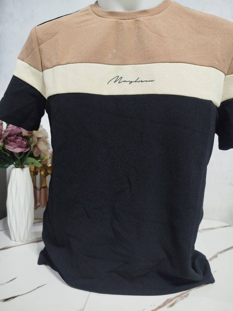 Mayhem Color Block T-shirt (Category: Tshirts & Polo Shirts ) located in Mandaluyong City. Submitted by allinthehood (Listing ID 1434561401, Image 2). Description: - Mayhem color block t-shirt - Features a crew neck and short sleeves - Color block design: black, tan, and cream - Subtle Mayhem logo print - Textured fabric.