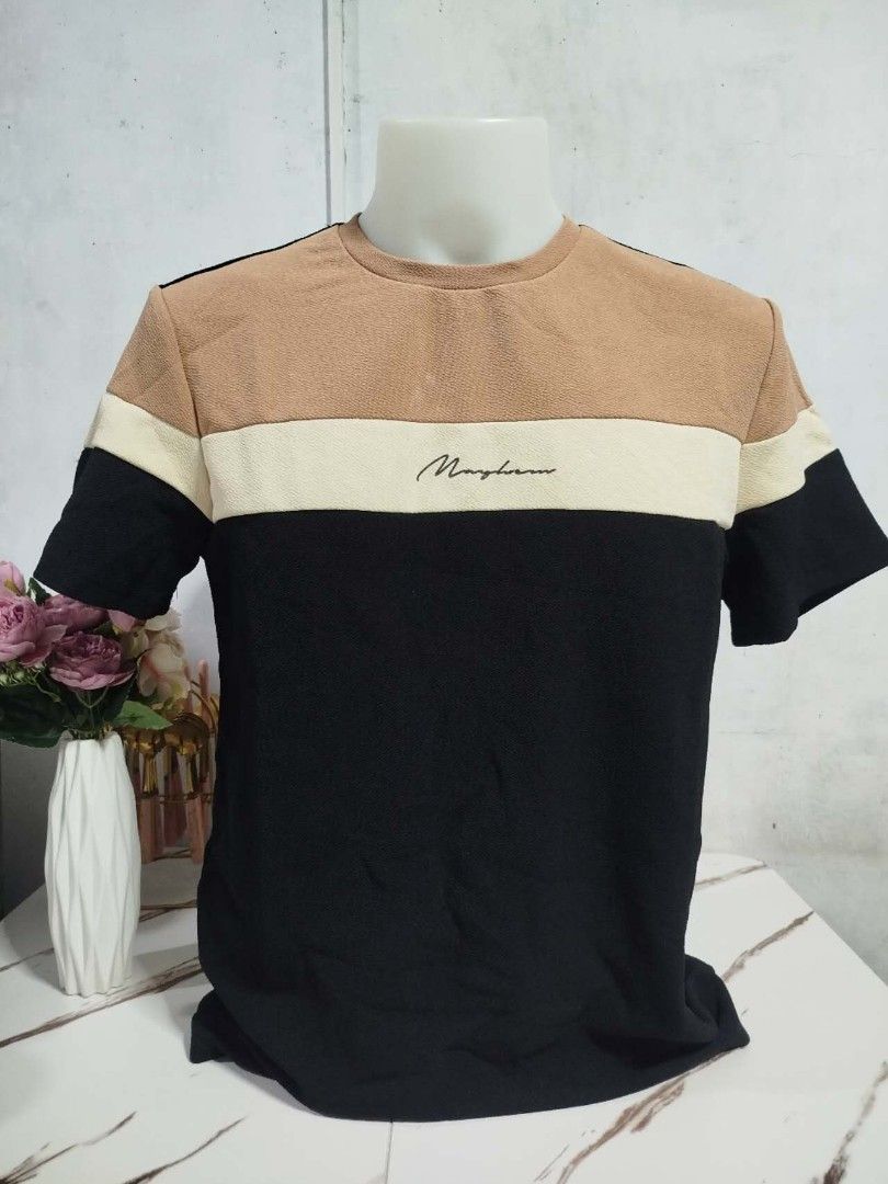 Mayhem Color Block T-shirt (Category: Tshirts & Polo Shirts ) located in Mandaluyong City. Submitted by allinthehood (Listing ID 1434561401, Image 3). Description: - Mayhem color block t-shirt - Features a crew neck and short sleeves - Color block design: black, tan, and cream - Subtle Mayhem logo print - Textured fabric.