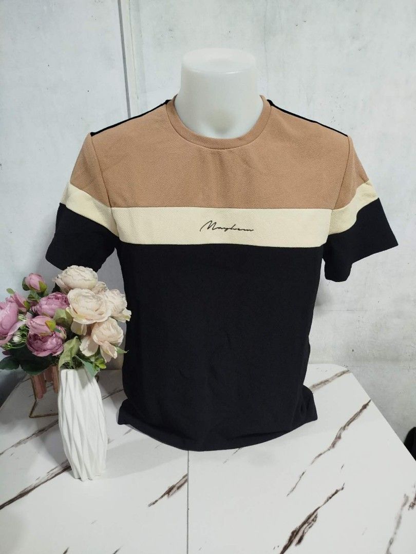 Mayhem Color Block T-shirt (Category: Tshirts & Polo Shirts ) located in Mandaluyong City. Submitted by allinthehood (Listing ID 1434561401, Image 1). Description: - Mayhem color block t-shirt - Features a crew neck and short sleeves - Color block design: black, tan, and cream - Subtle Mayhem logo print - Textured fabric.