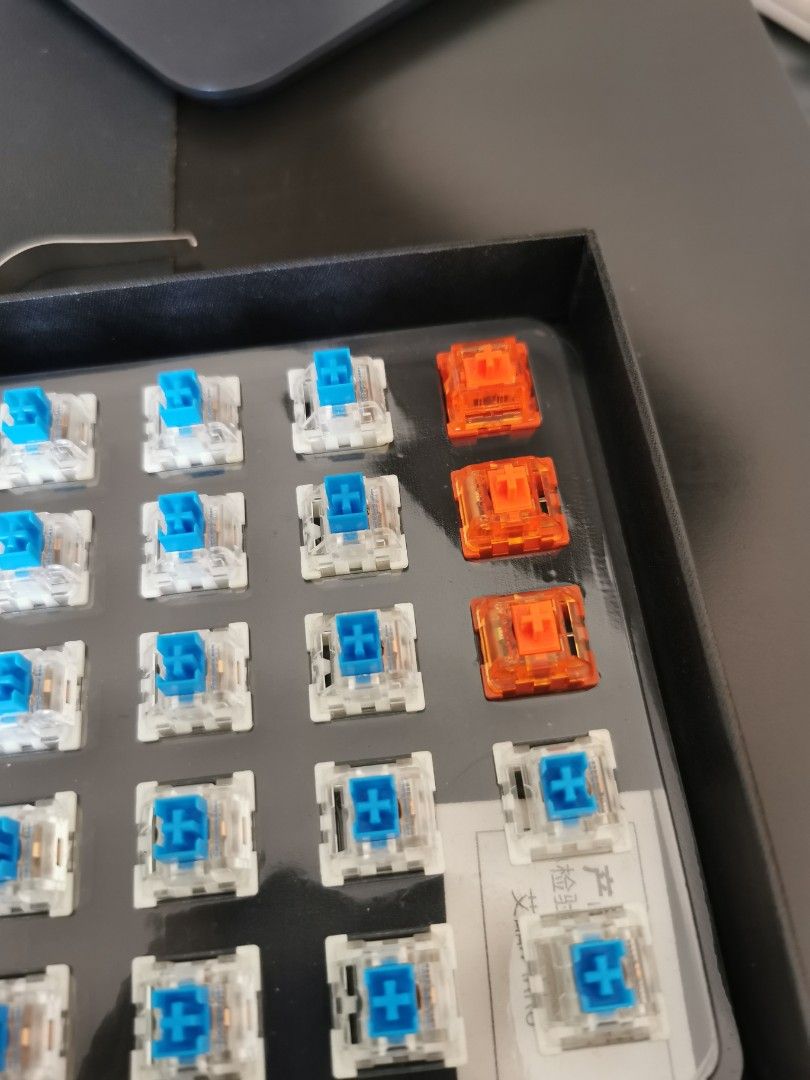 Mechanical Keyboard Switches - Various Types (Category: Computer Keyboard) located in Imus. Submitted by allyzahb99 (Listing ID 1434425111, Image 3). Description: - Mechanical keyboard switch set - Includes brown, blue, and red-orange switches - Comes in a convenient tray - Offers different tactile and auditory feedback - Perfect for keyboard customization - 45 pcs.