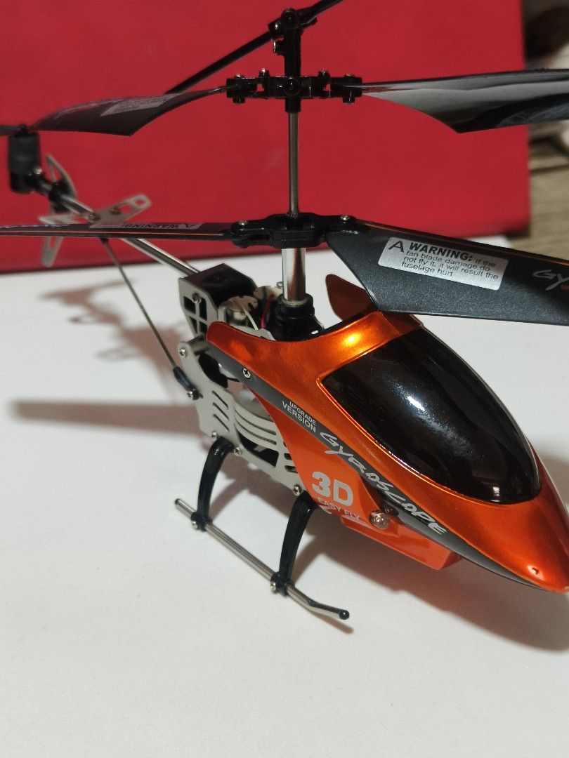 Mini RC Helicopter (Category: Remote Control Toys) located in Makati City. Submitted by franco31 (Listing ID 1434417983, Image 1). Description: For RC Heli hobbyist: Full aluminum metal frame, just need to replace 3.7V LiPo battery, to make it run again. No issues, very stable flight. Includes plastic case box to keep it secure..