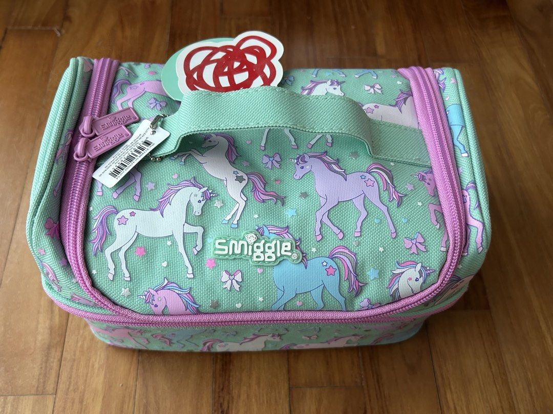 NEW Smiggle Unicorn Thermal Lunchbox authentic (Category: Stationery & School Supplies) located in Singapore. Submitted by sophibel (Listing ID 1434410121, Image 1). Description: Brand new Smiggle lunchboxes Thermal inner lining Genuine bought from Smiggles store 2 available- unicorn and polka dots $15 each bag Both items are new with tags attached. Pick up Suntec city or Tanah Merah.