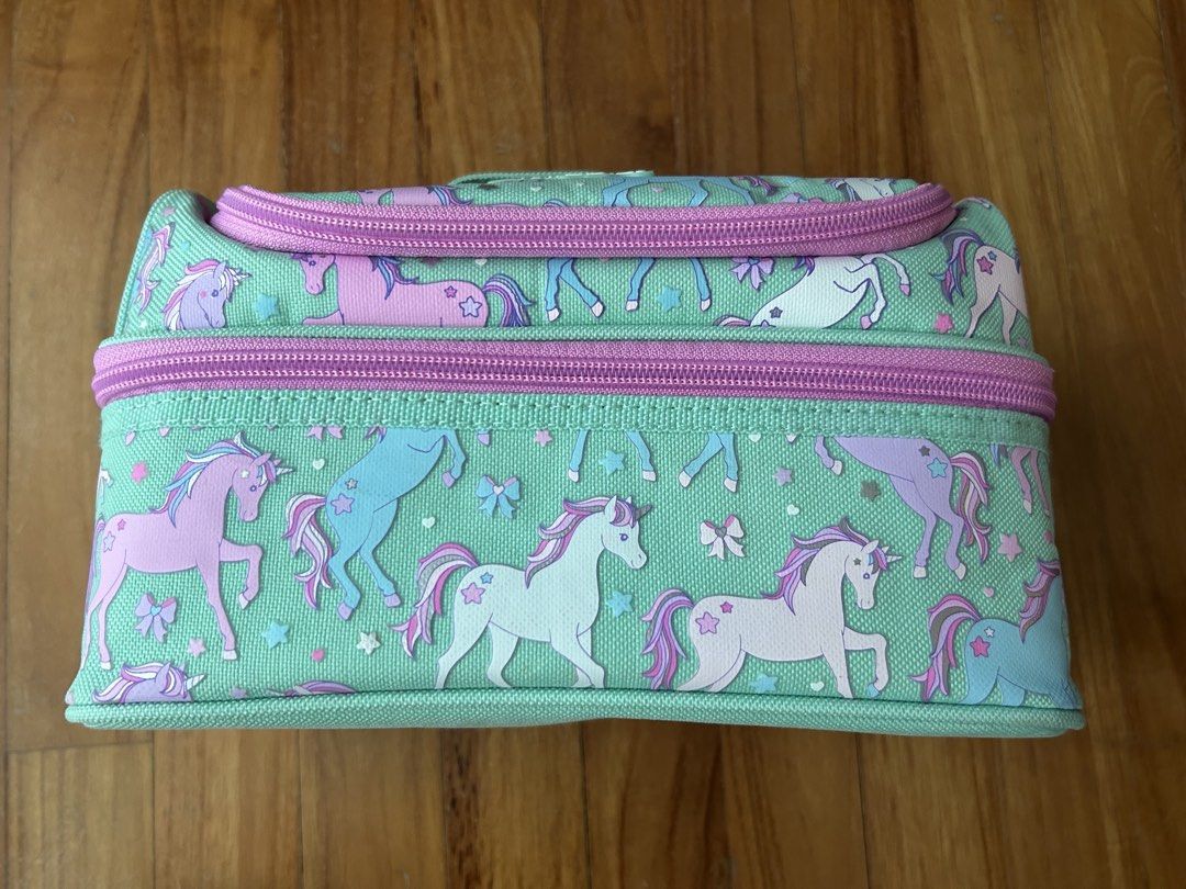 NEW Smiggle Unicorn Thermal Lunchbox authentic (Category: Stationery & School Supplies) located in Singapore. Submitted by sophibel (Listing ID 1434410121, Image 2). Description: Brand new Smiggle lunchboxes Thermal inner lining Genuine bought from Smiggles store 2 available- unicorn and polka dots $15 each bag Both items are new with tags attached. Pick up Suntec city or Tanah Merah.