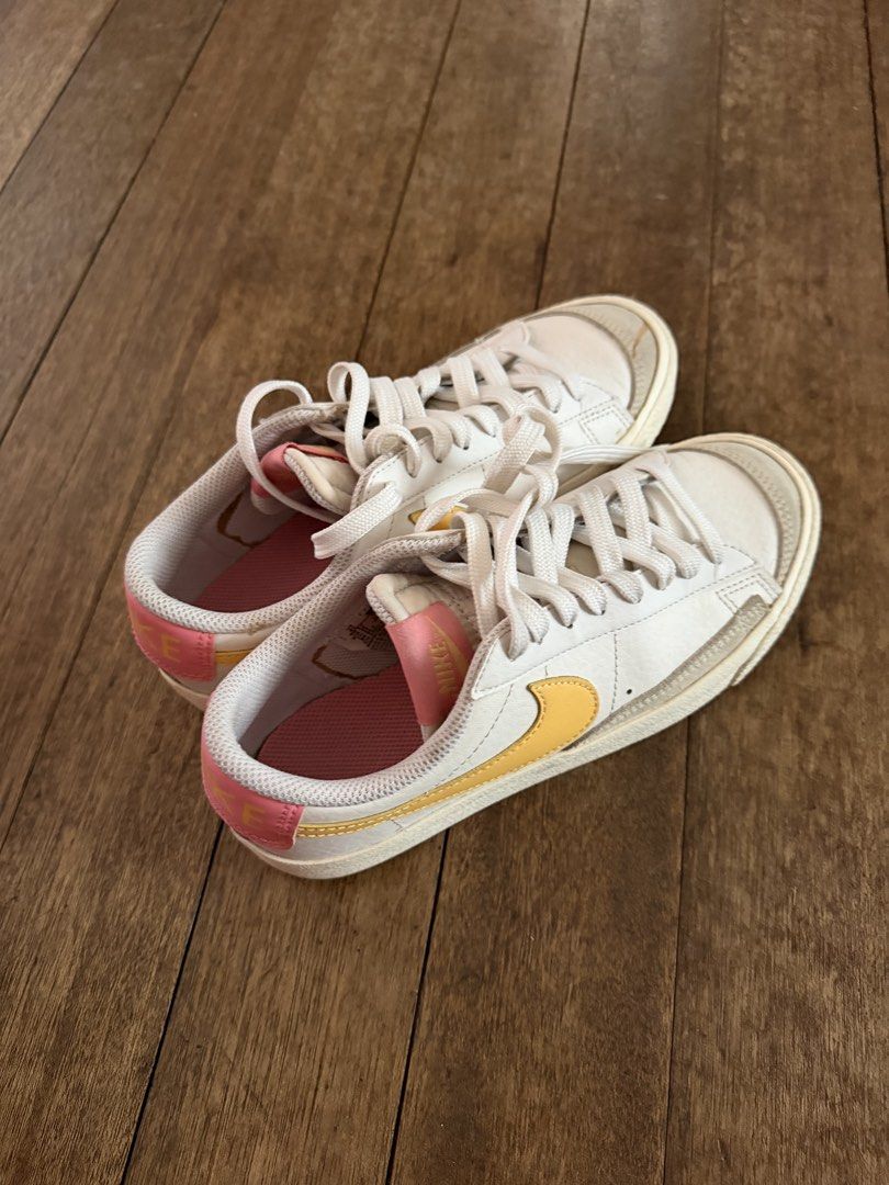 Nike Blazer Low '77 (GS) - White/Gold (Category: Sneakers) located in Quezon City. Submitted by ad.attic (Listing ID 1434398189, Image 2). Description: - Nike Blazer Low '77 (GS) - Color: White with gold accents - Size: UK 3.5, CM 23, EUR 36 - Features: White laces, pink interior - Kid’s size - Price: negotiable.