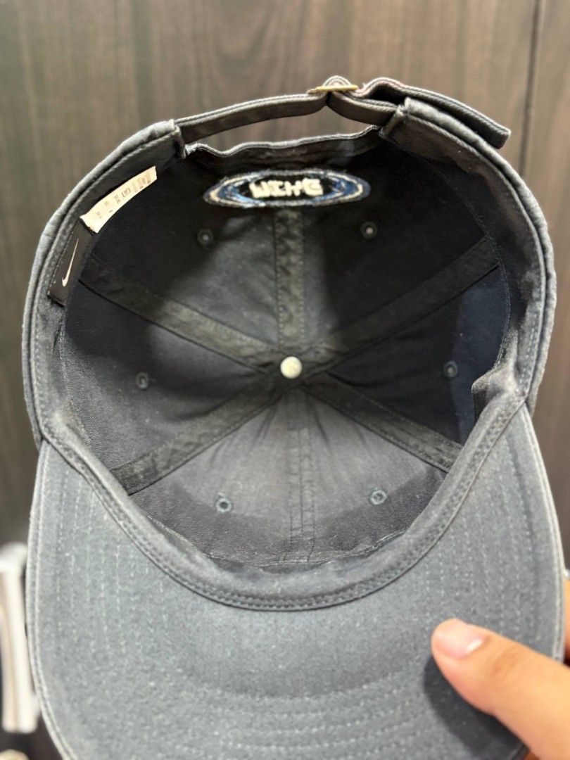 Nike Cap (Category: Caps & Hats) located in Quezon City. Submitted by trellzilla666 (Listing ID 1434527274, Image 3). Description: - Nike cap with a unique blue and white logo. - Nike logo on the back. - Adjustable strap for a perfect fit. - Made of durable material, ideal for everyday wear..
