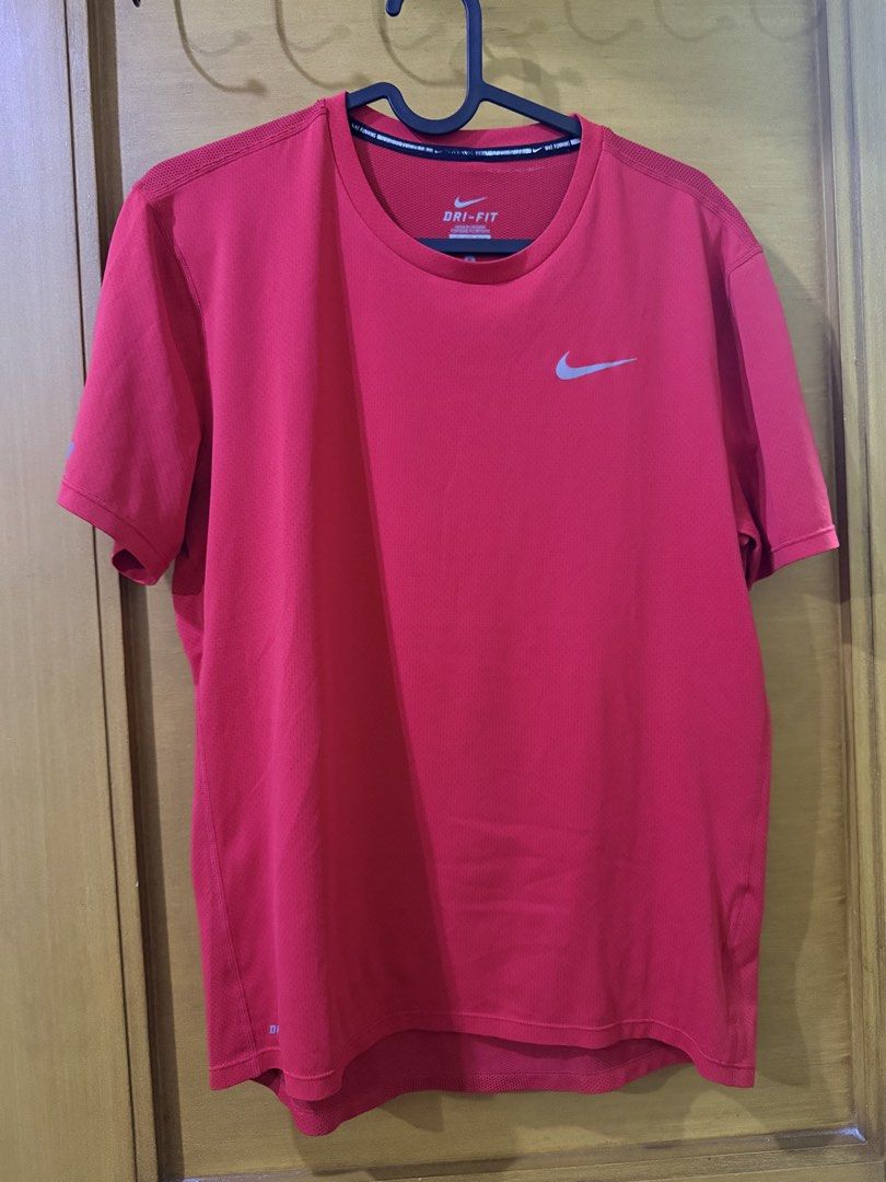 Nike Dri-FIT Running Shirt (Category: Activewear) located in Taguig. Submitted by denpaz (Listing ID 1434516256, Image 1). Description: - Nike Dri-FIT running shirt - Color: Red - Size: Small .