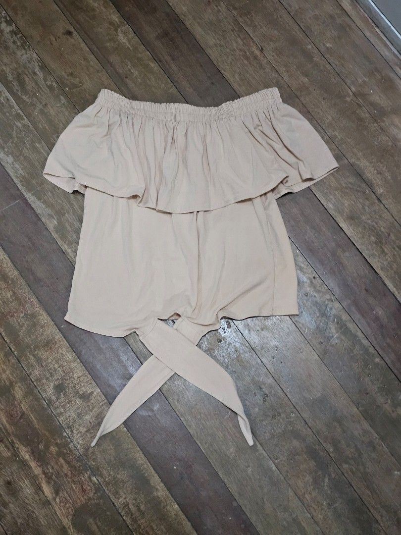 Off-Shoulder Top with Tie Detail (Category: Blouses) located in Manila. Submitted by corickety (Listing ID 1434463565, Image 1). Description: • Shoulder Width: 13in • Length: 16in • No stains or damage •With tie detail • Elastic Neckline.