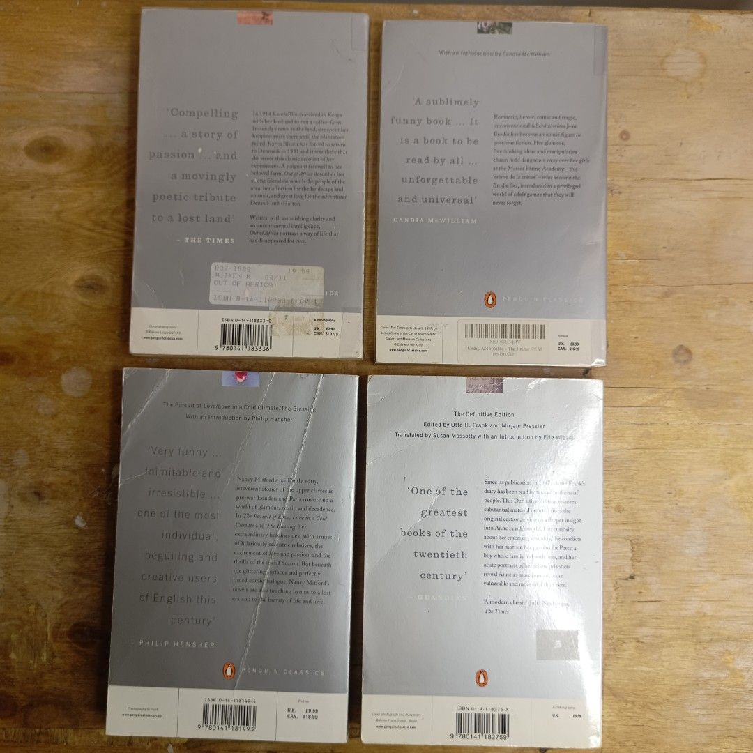 Penguin Classics Books - Set of 4 (Category: Storybooks) located in Manila. Submitted by shelfenjoyment (Listing ID 1434563812, Image 2). Description: 449 each. Take all for 1000. Set of four Penguin Classics books. Titles include "Out of Africa" by Karen Blixen, "The Prime of Miss Jean Brodie" by Muriel Spark, "Love in a Cold Climate" by Nancy Mitford, and "The Diary of a Young Girl" by Anne Frank. Perfect for any book lover or collector..
