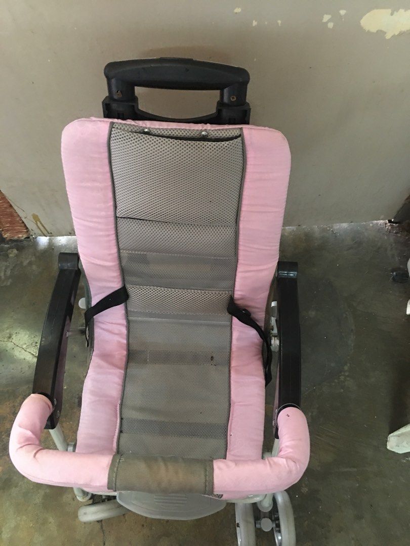 Pink Baby Stroller (Category: Strollers) located in Marikina City. Submitted by cantalejoy86806 (Listing ID 1434397554, Image 2). Description: - Pink and gray color scheme - Easy-to-push handle - Safety harness for secure seating - Four wheels for stability - Includes a footrest - Lightweight and foldable for easy storage and transport.
