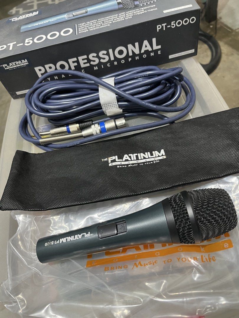Platinum PT-5000 Professional Dynamic Microphone (Category: Microphones) located in Quezon City. Submitted by sgsofficialstore (Listing ID 1434442171, Image 2). Description: - Platinum PT-5000 dynamic microphone - Ideal for vocal performances, karaoke, and stage applications - Includes a cable and carrying pouch - Features an on/off switch for convenience - Color: Dark steel blue.