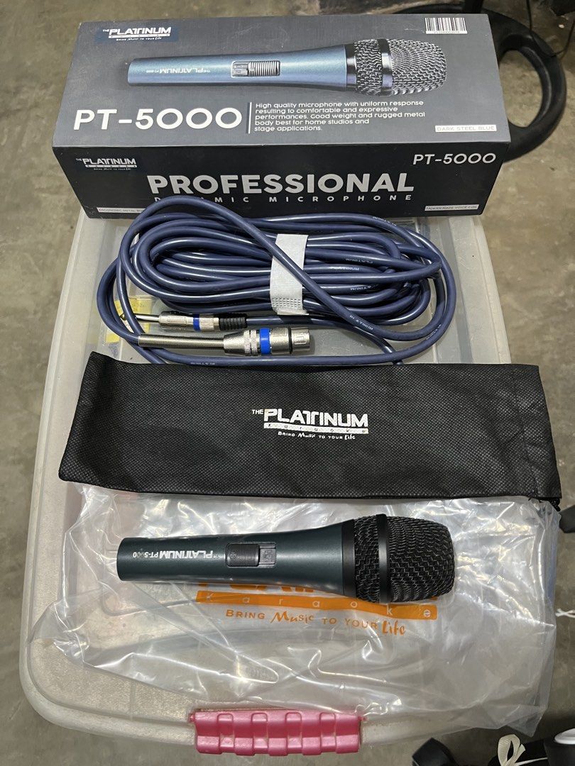 Platinum PT-5000 Professional Dynamic Microphone (Category: Microphones) located in Quezon City. Submitted by sgsofficialstore (Listing ID 1434442171, Image 3). Description: - Platinum PT-5000 dynamic microphone - Ideal for vocal performances, karaoke, and stage applications - Includes a cable and carrying pouch - Features an on/off switch for convenience - Color: Dark steel blue.