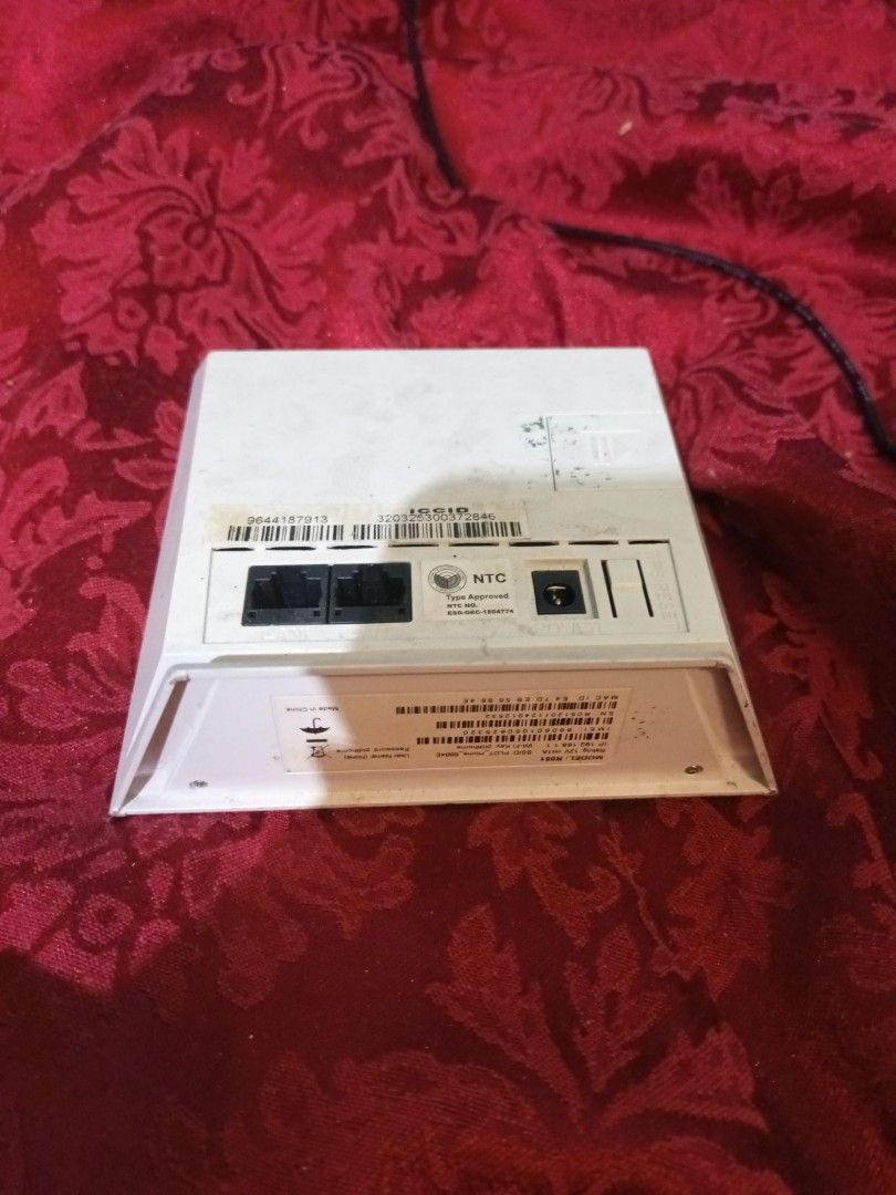 PLDT Home Smart LTE Router Model RO51 (Category: Networking) located in Makati City. Submitted by epic_prelovedmakati (Listing ID 1434425987, Image 2). Description: - PLDT Home Smart LTE Router - Includes router and power adapter - Features: - LAN ports - Phone line ports - SIM card slot - Uses Smart LTE.