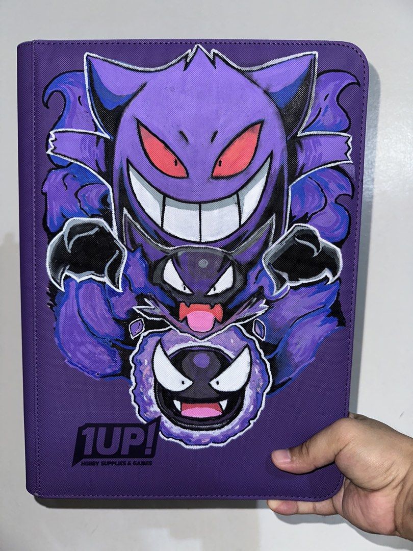 Pokemon TCG Custom Binders (Category: Trading Cards Accessories) located in Pasig City. Submitted by catwonieebuys (Listing ID 1434547693, Image 3). Description: - we customize 2x2 and 3x3 binders!! - hand painted designs (NOT PRINTED!!) - three premade design ready to use binders (eeveelutions 2x2, psyduck 2x2, & gengar 3x3) - base prices are: 2x2 size is ₱3500 and 3x3 size is ₱4500 - prices may still vary depending on the design, size, and bind