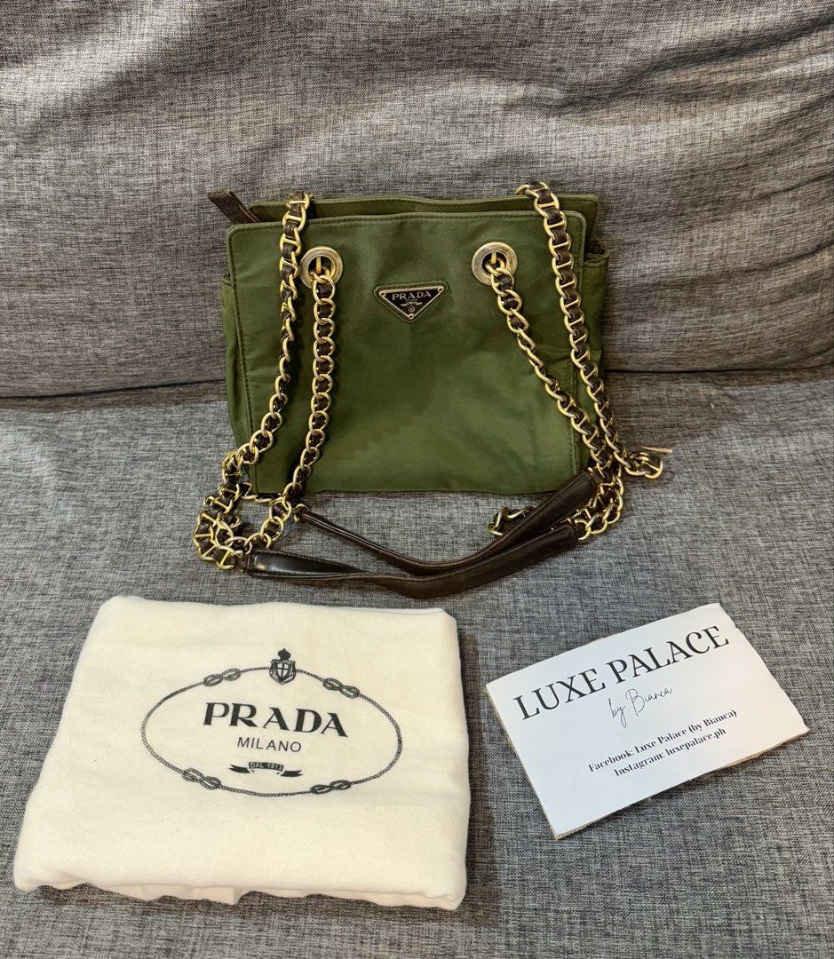 PRADA authentic green tessuto nylon chain small shoulder bag (Category: Luxury Bags & Wallets) located in Cainta. Submitted by houseofcarry (Listing ID 1282960357, Image 1). Description: PRADA tessuto nylon chain shoulder bag ⚜️ Guaranteed authentic 💯 Money-back guarantee if proven otherwise ⚜️ Comes with a generic dust bag only ⚜️ Please note: Minor discoloration on the interior due to age. Kindly refer to the last photos for condition details.
