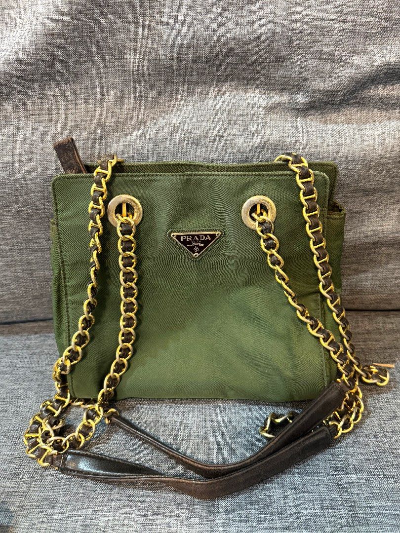 PRADA authentic green tessuto nylon chain small shoulder bag (Category: Luxury Bags & Wallets) located in Cainta. Submitted by houseofcarry (Listing ID 1282960357, Image 2). Description: PRADA tessuto nylon chain shoulder bag ⚜️ Guaranteed authentic 💯 Money-back guarantee if proven otherwise ⚜️ Comes with a generic dust bag only ⚜️ Please note: Minor discoloration on the interior due to age. Kindly refer to the last photos for condition details.