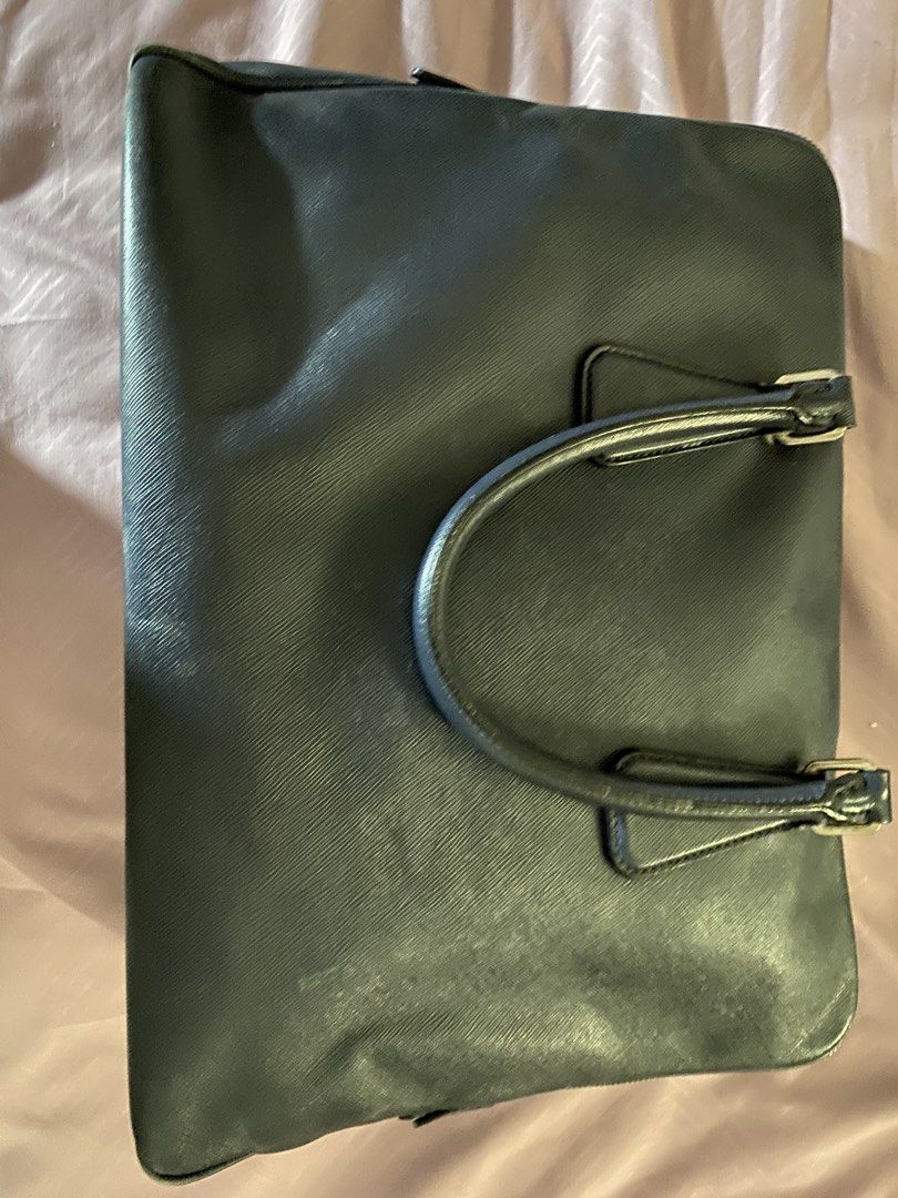 Prada briefcase (Category: Luxury Bags & Wallets) located in Manila. Submitted by lauro.catibayan (Listing ID 1434502846, Image 1). Description: Prada Safianobriefcase color blue. With rubs at the edges .