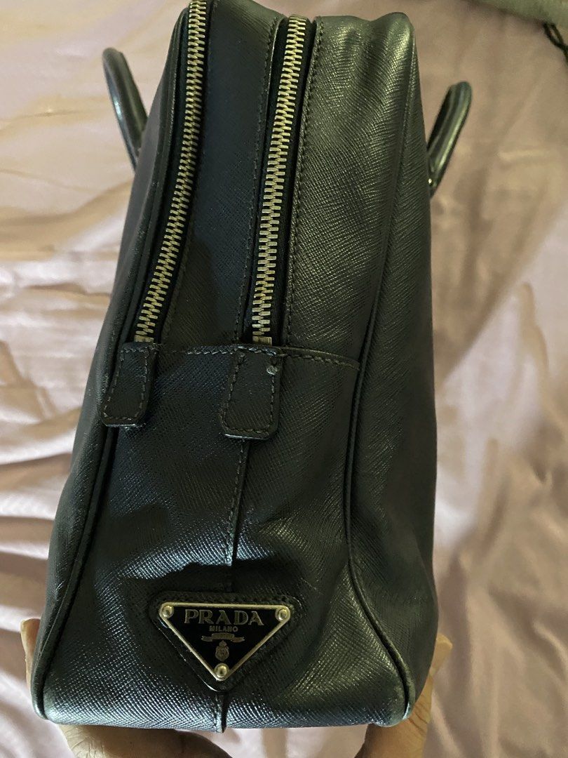 Prada briefcase (Category: Luxury Bags & Wallets) located in Manila. Submitted by lauro.catibayan (Listing ID 1434502846, Image 3). Description: Prada Safianobriefcase color blue. With rubs at the edges .